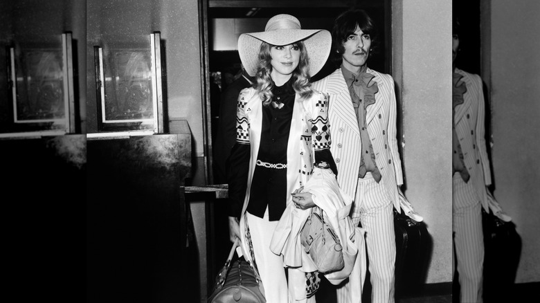 Pattie Boyd and George Harrison walking