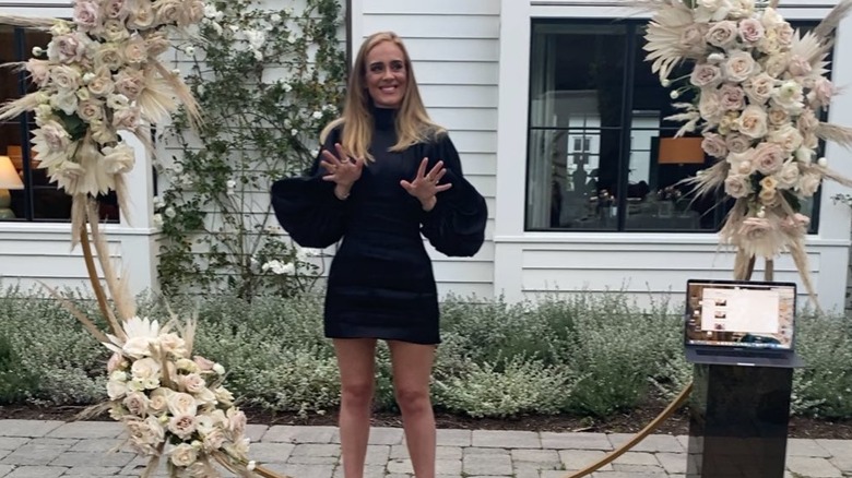 Adele in a black dress