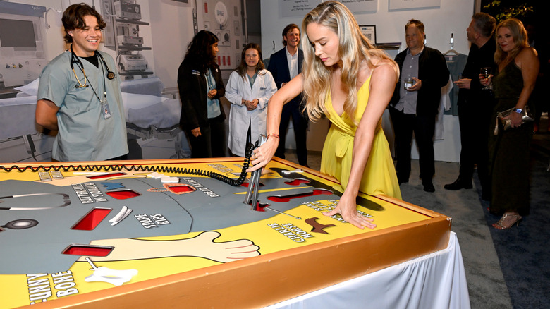 Brie Larson playing operation at a pre-Emmy party