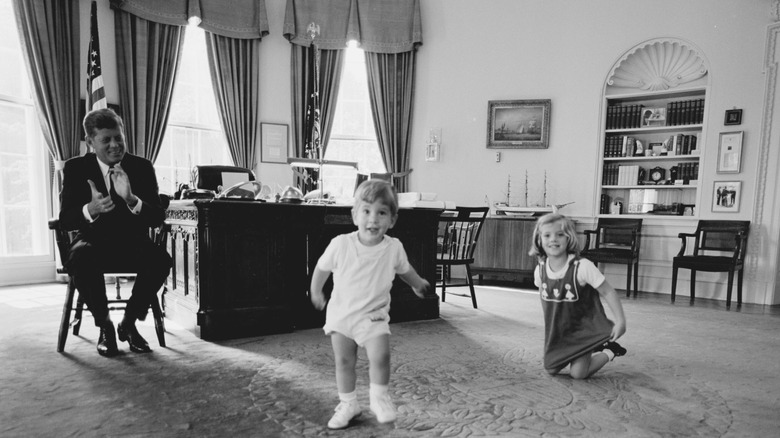 President JFK with Caroline Kennedy and John F. Kennedy Jr. at the White House