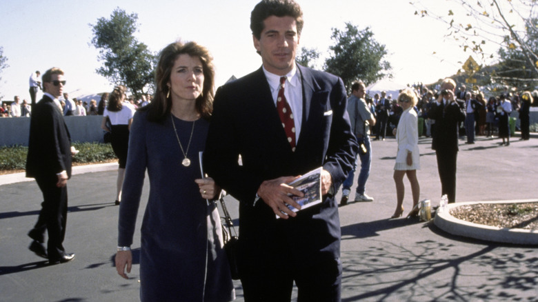 Caroline Kennedy and John F. Kennedy Jr. walking in 1995