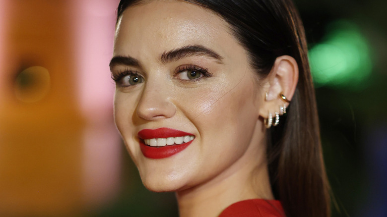 Lucy Hale smiling at event