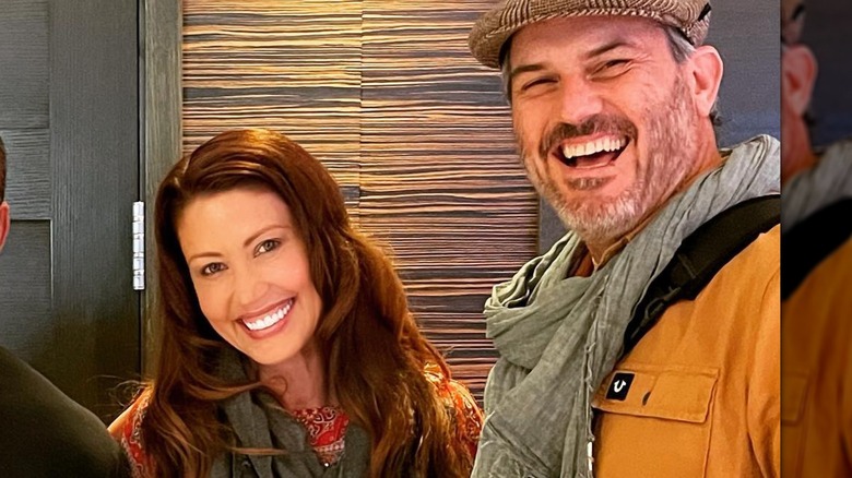 Shannon Elizabeth posing with Simon Borchert