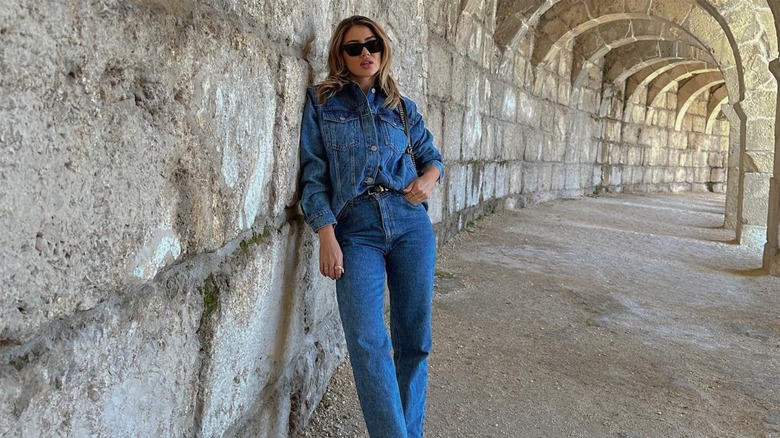 Blonde woman in denim outfit