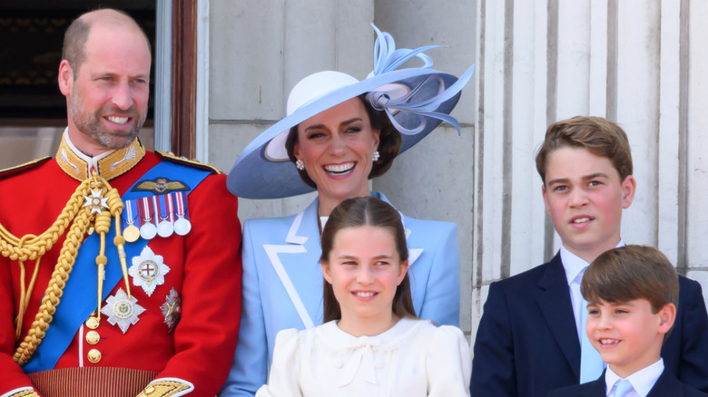 Prince William, Kate Middleton, Princess Charlotte, Prince George, and Prince Louis posing for cameras on the Buckingham Palace balcony following the 2026 Trooping the Colour