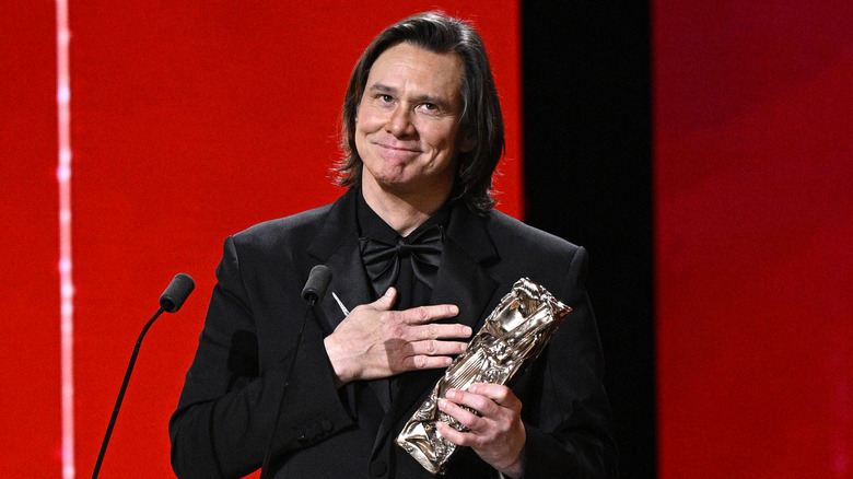 Jim Carrey accepting an award at the 2026 César Awards