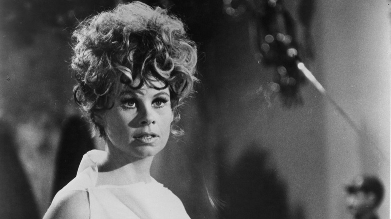 Sue Ane Langdon with curly hair updo.
