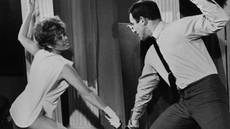 Sue Ane Langdon fencing with Paul Mantee.