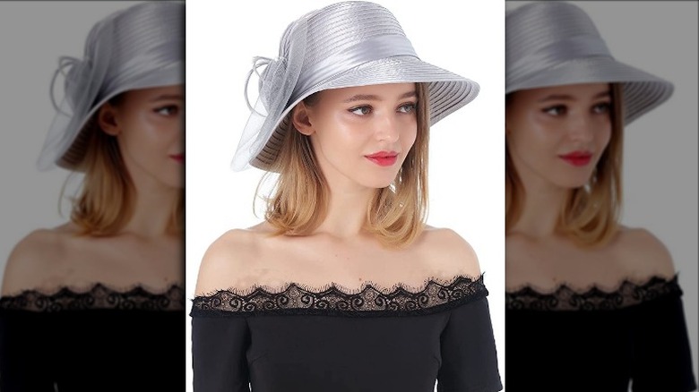 woman wearing Fancy Kentucky Derby style sun hat grey