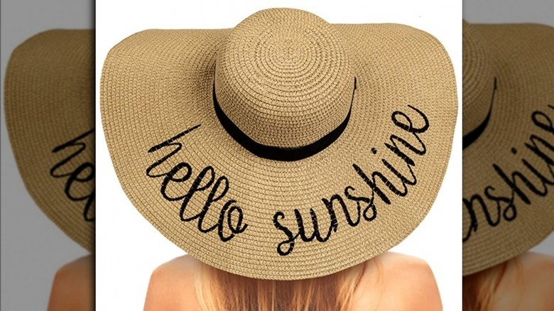 Chalier floppy straw sun hat with "hello sunshine" embroidered on rim 
