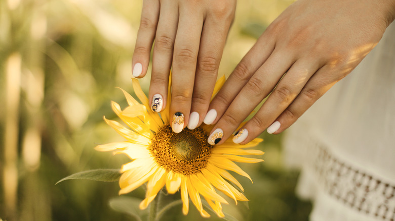 sunflower nails on sunflower 