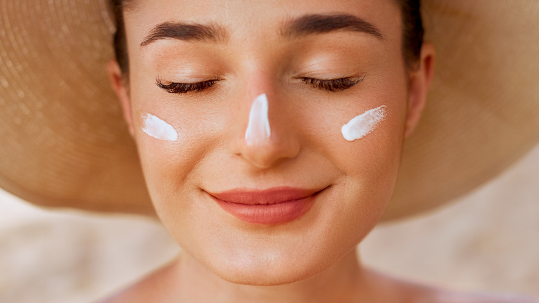 Woman with sunscreen on