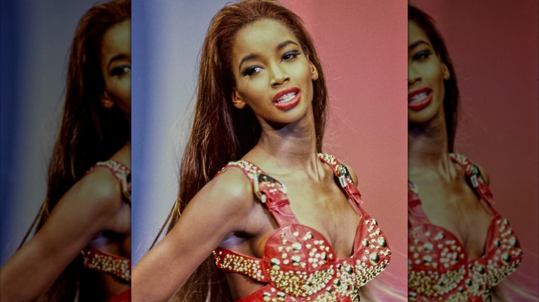 Beverly Peele tilting her head back