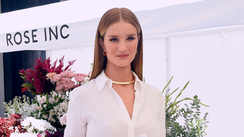 Rosie Huntington-Whitely smiling slightly