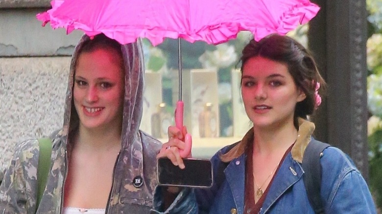 Suri Cruise and friend smiling