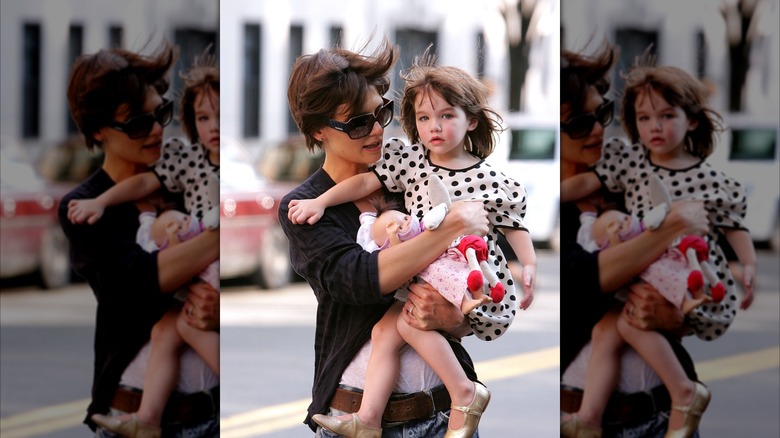Katie Holmes carrying Suri Cruise in New York in 2008