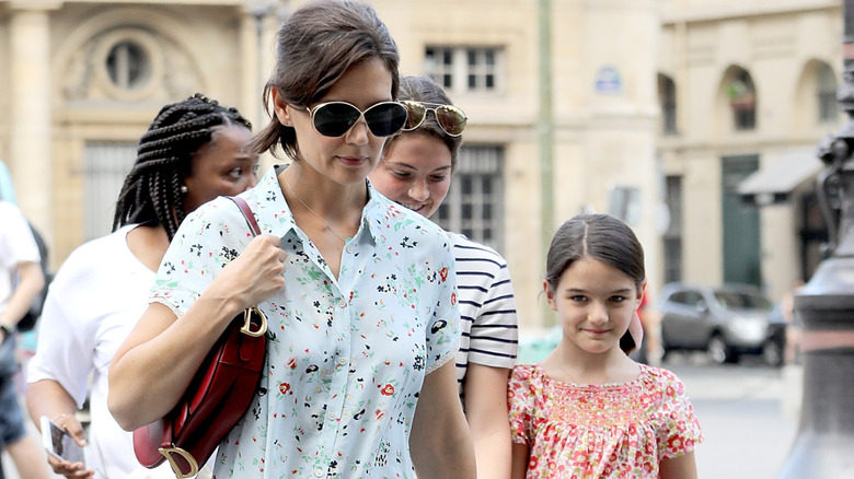 Katie Holmes walking with Suri Noelle