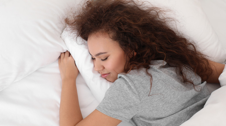 woman sleeping in bed