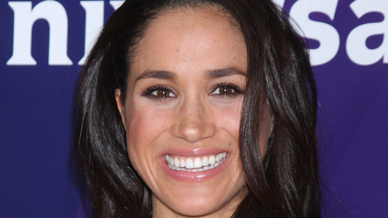 Meghan Markle smiling at event