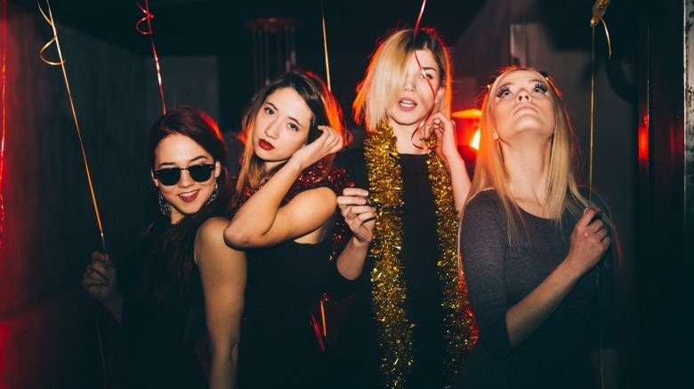 Four women partying together