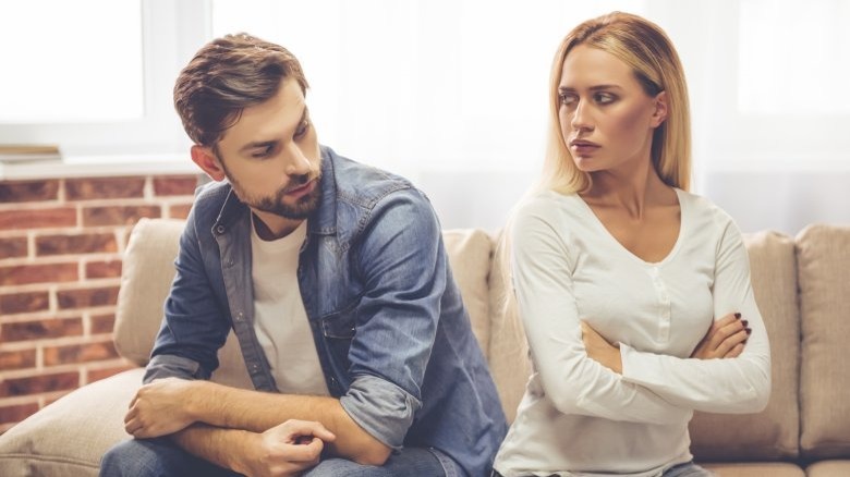 A man and woman fighting