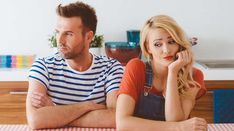 A couple that is not making eye contact