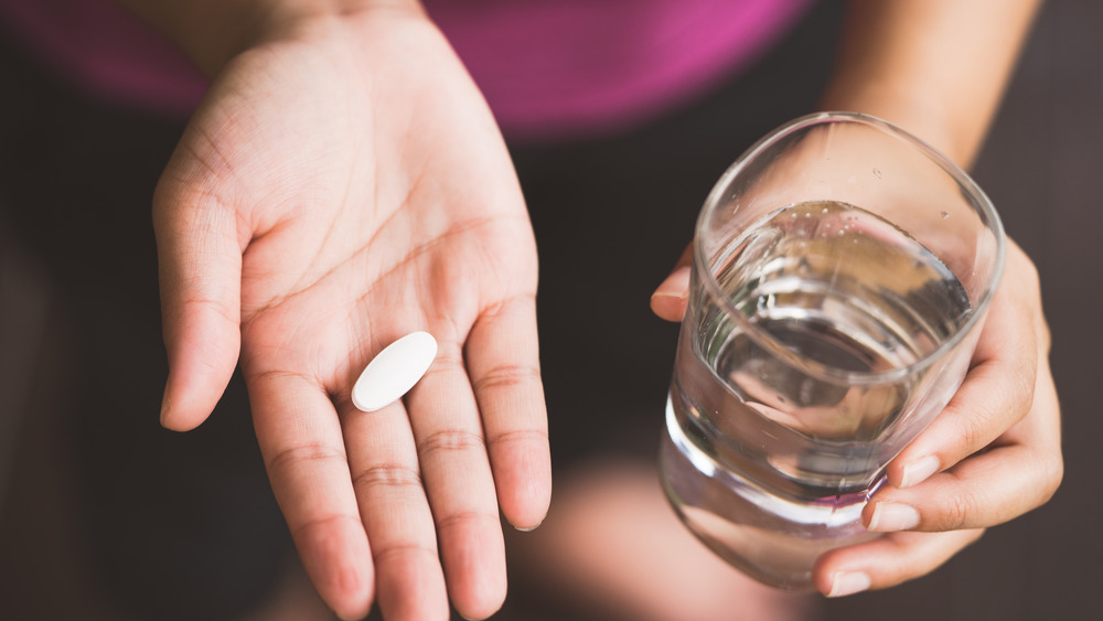 Pill and a glass of water