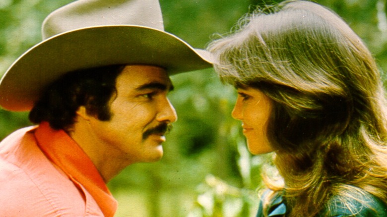 Sally Field and Burt Reynolds looking at each other