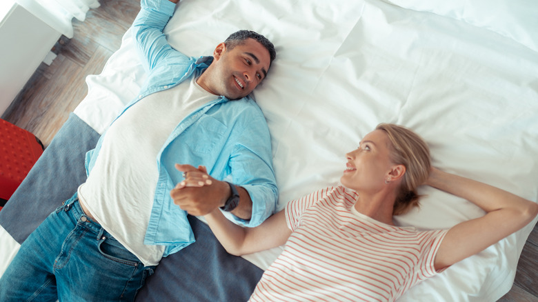 Holding hands while in sleep positions