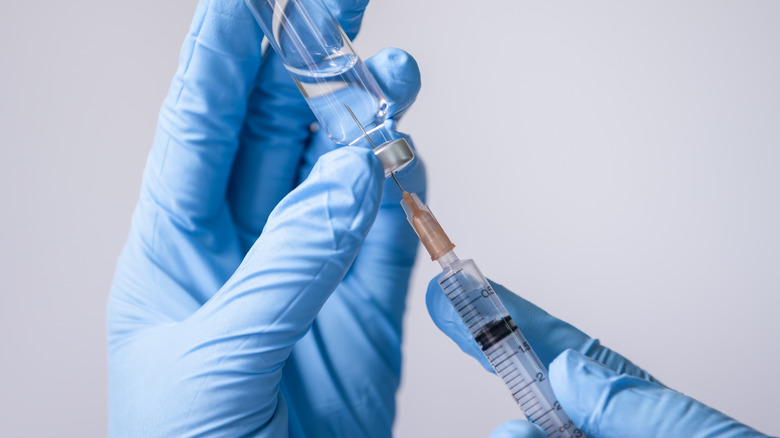 Doctor prepares a vaccine