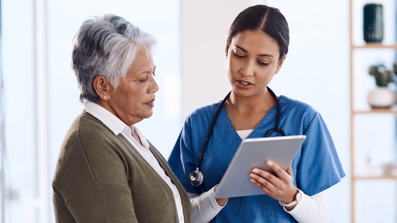 Patient speaking with nurse