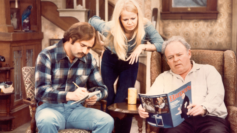 Rob Reiner, Sally Struthers, and Carroll O'Connor in an episode of 