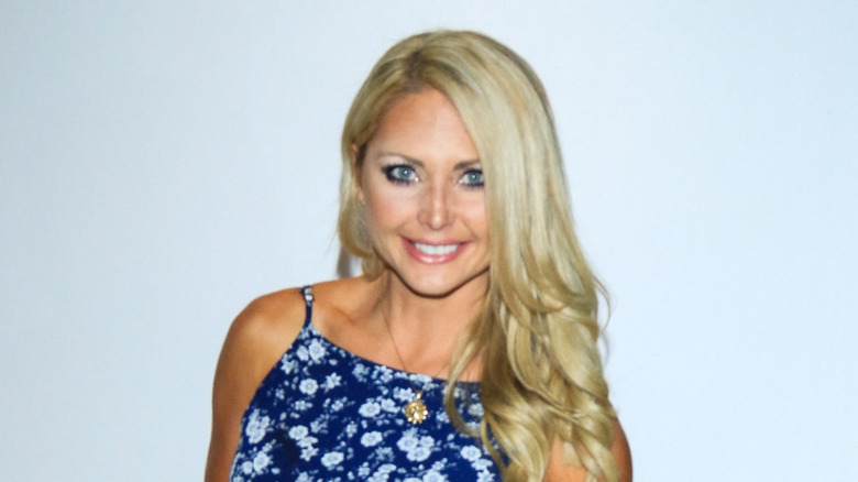 Kat Edorsson posing in front of a white background