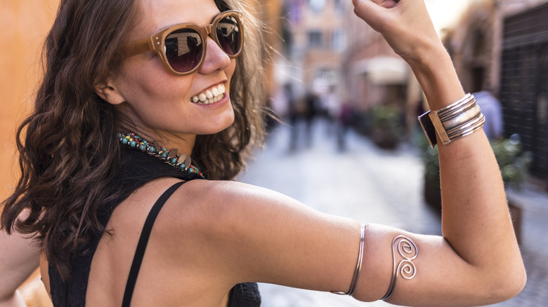 woman wearing cuff bracelet on the street