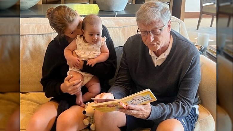 Bill Gates reads a book to Leila