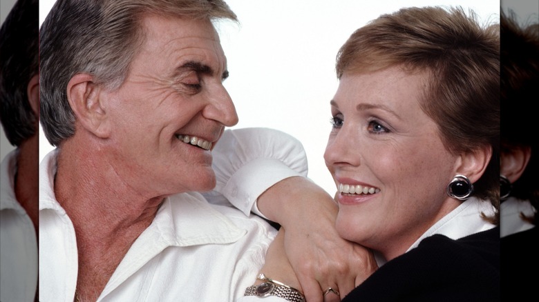 Julie Andrews leaning on the shoulder of her husband Blake Edwards
