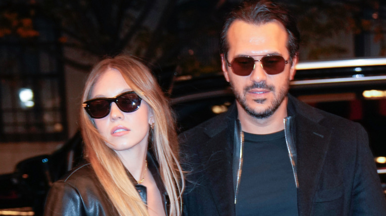 Sydney Sweeney and Jonathan Davino wearing sunglasses