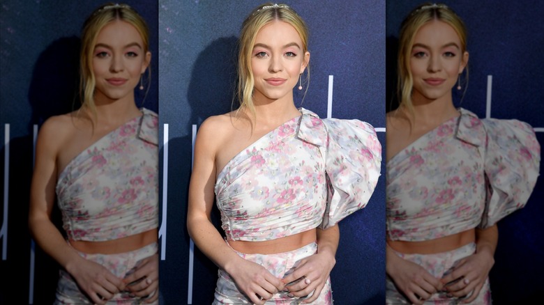 Sydney Sweeney floral one-shoulder crop top