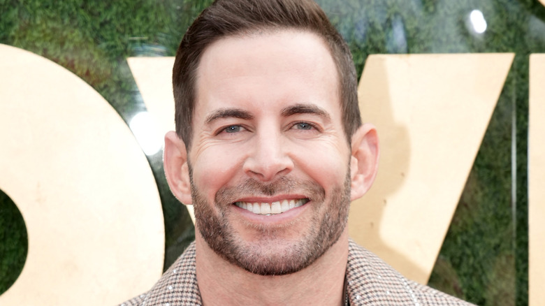 Tarek El Moussa grinning 