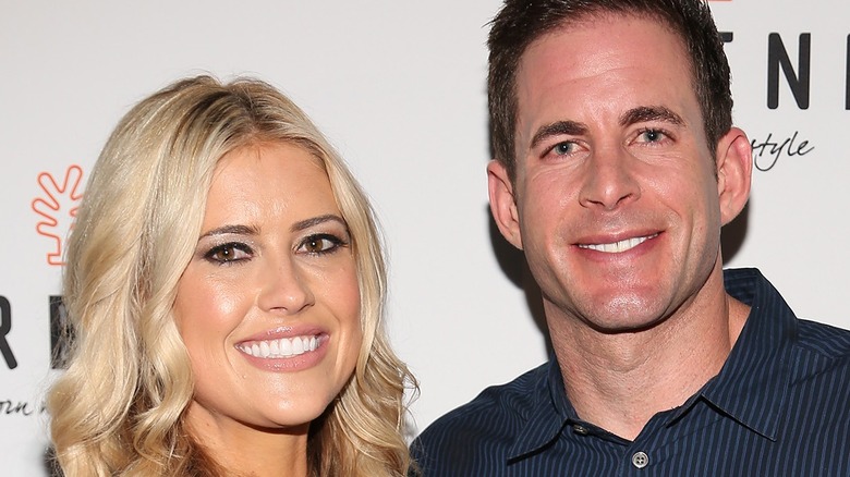 Tarek El Moussa and Christina Haack  posing at event