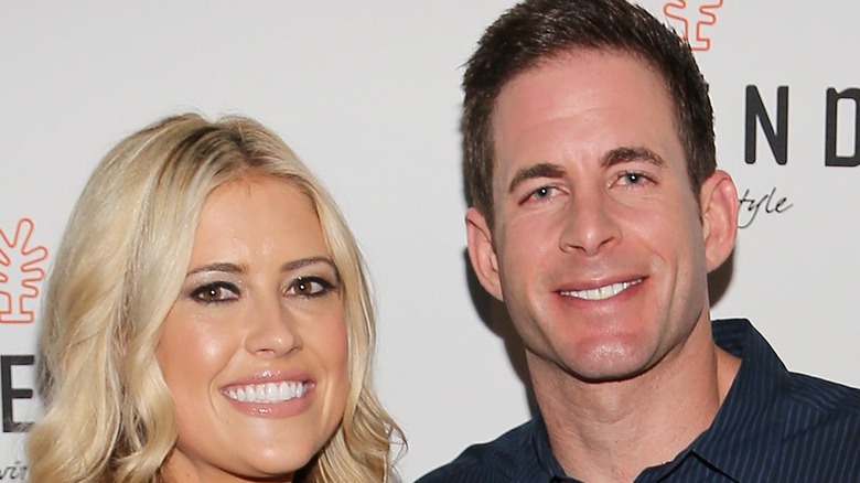 Tarek El Moussa and Christina Haack pose