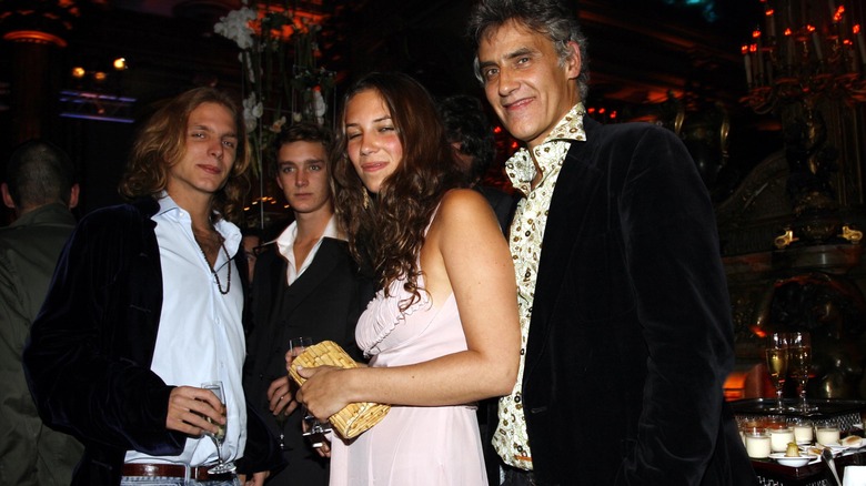 Young Tatiana and her father, smiling