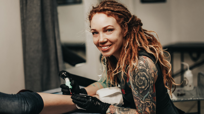 Person being tattooed