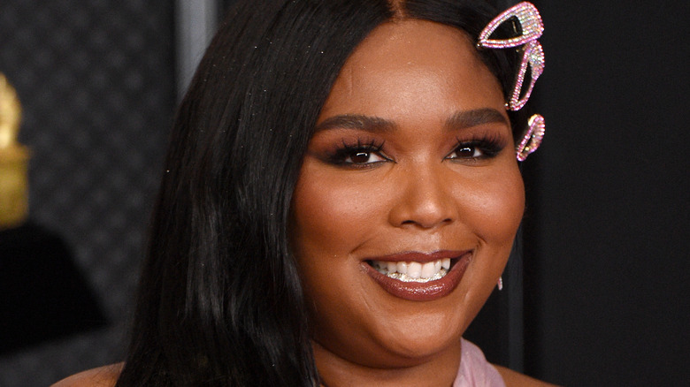 Lizzo in a pink dress