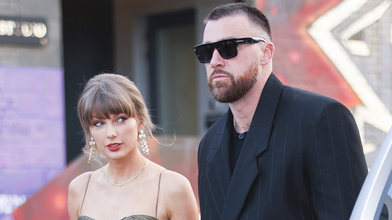 Taylor Swift and Travis Kelce walking together