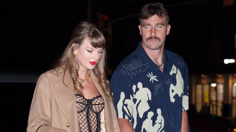 Taylor Swift and Travis Kelce walking together