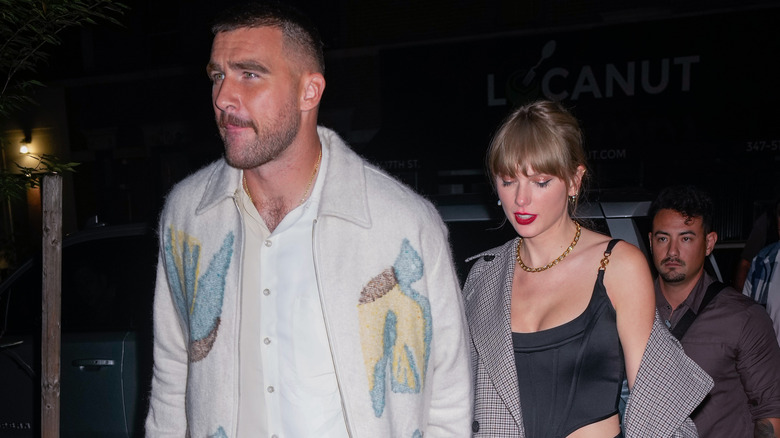 Travis Kelce and Taylor Swift walking together