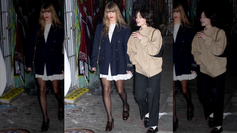 Taylor Swift and Gracie Abrams walking side-by-side outdoors.