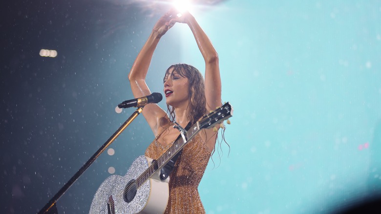 Taylor Swift playing in the rain at Gillette Stadium