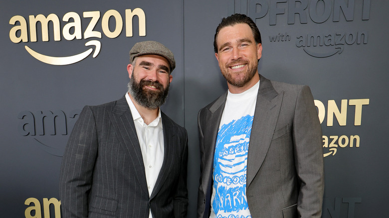 Jason Kelce and Travis Kelce posing together at the Amazon Upfront 2025